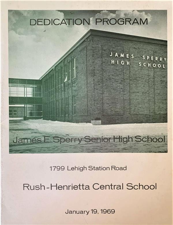 The front of the program for the new building's dedication showing a photo of the building